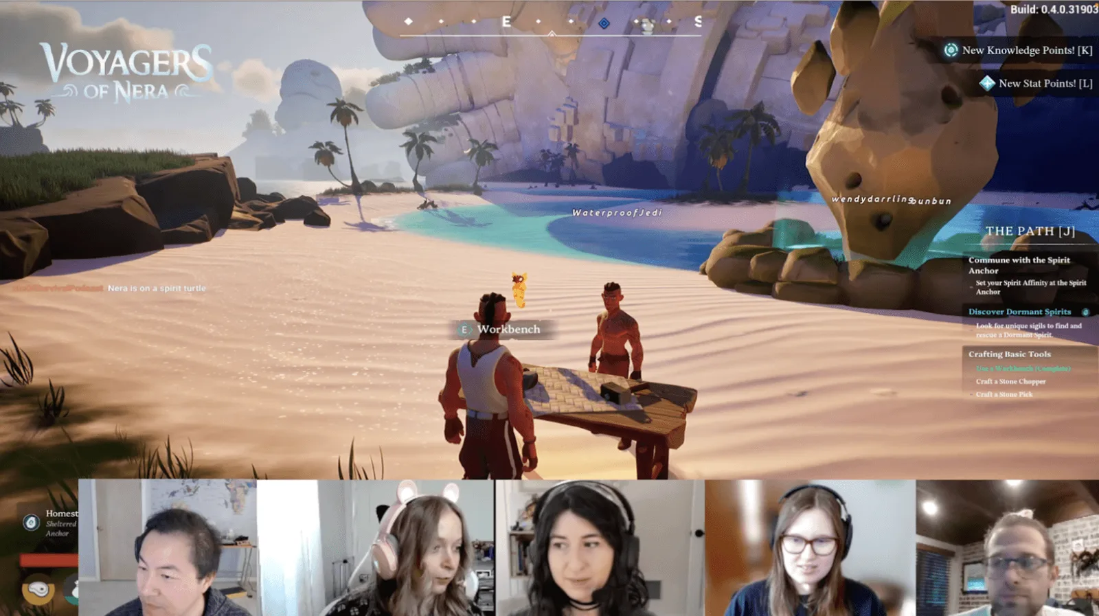 A Voyagers of Nera session streaming live in Live Aware, players gathered on a beach in game, with a row of playtester webcams along the bottom of the screen.